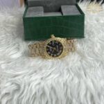 ساعت مچی رولکس فول نگین طلایی صفحه مشکی ROLEX DAYTE JUST 1050