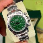 ساعت مچی رولکس دیتونا مردانه طلایی صفحه مشکی Rolex Daytona 255981