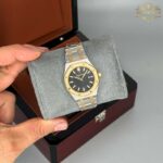 ساعت زنانه اودمار پیگه دو رنگ طلایی نقره ای صفحه مشکی Audemars piguet 2022