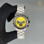 ساعت مچی مردانه تگ هویر فرمول یک نقره ای صفحه زرد Tag-Heuer Formula1