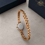 ساعت مچی زنانه دنیل ولینگتون طلایی صفحه سفید 2662 Daniel Wellington